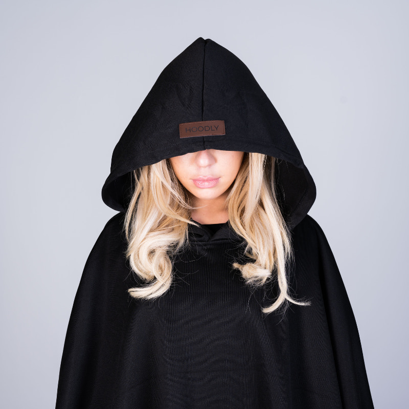 Close-up of the deep hood on the black Hoodly hoodie blanket