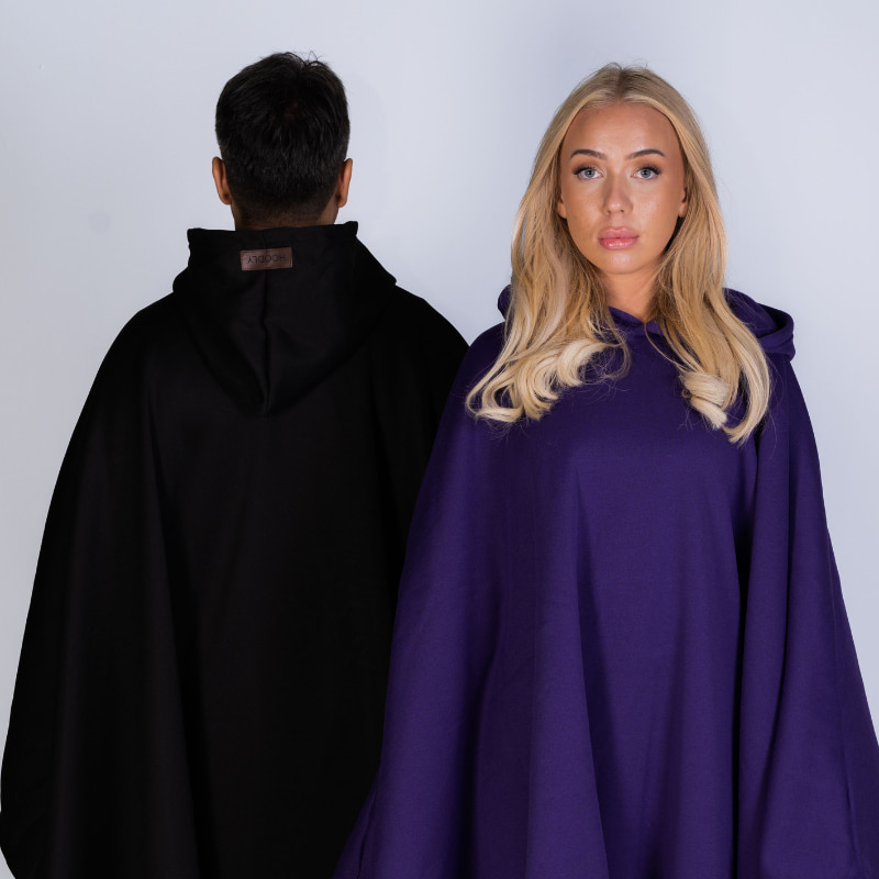 Black and purple Hoodly hoodie blankets side by side