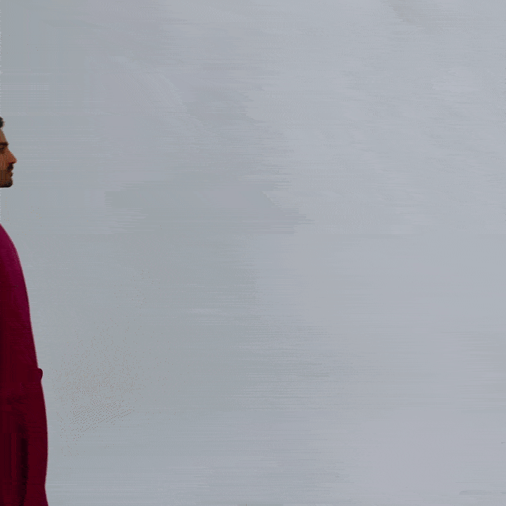 Woman walking in a red Hoodly hoodie blanket