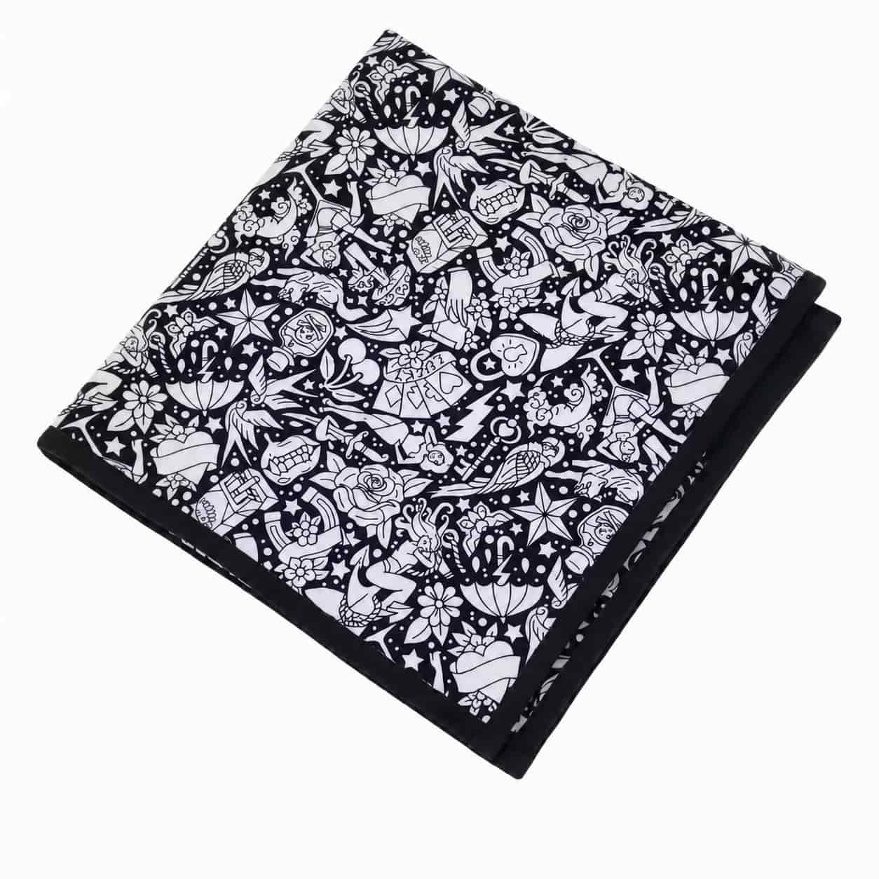 Folded coloring blanket with doodle tattoo print